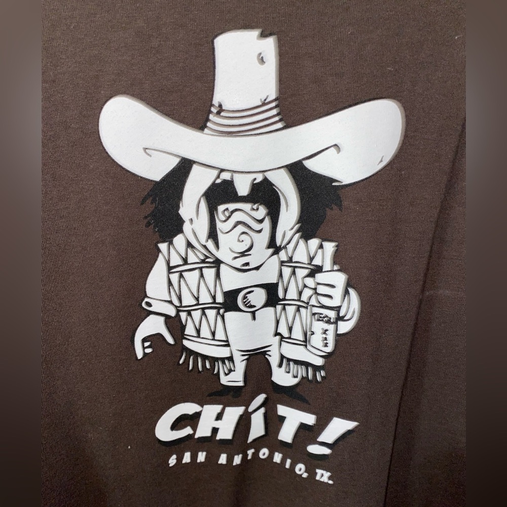 T-shirt from San Antonio. The shirt is chocolate brown and is men’s size 2XL.
